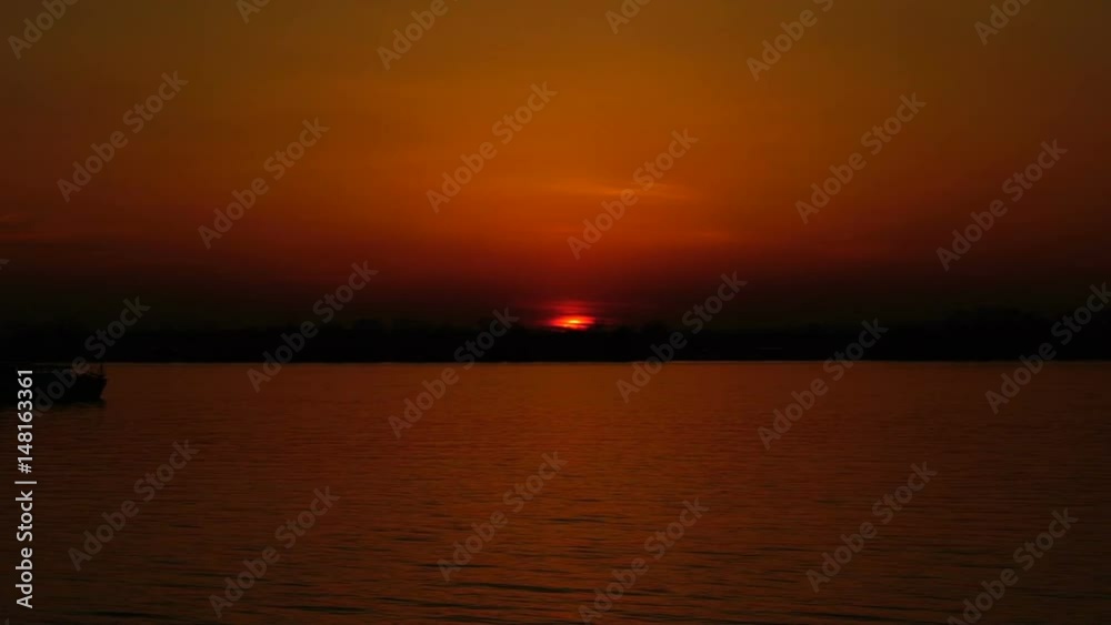 ship sails on the river at sunset background. ship sails on the river at sunset background.
