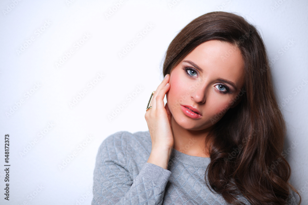 Portrait of an attractive fashionable young brunette woman Portrait of an attractive fashionable young brunette woman