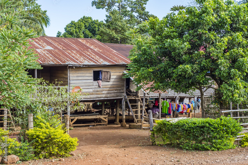 Typical wooden house in village in Laos