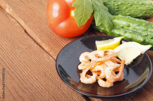 Mediterranean dish of fresh vegetables with shrimps. Dish of fresh, ecological clean products
