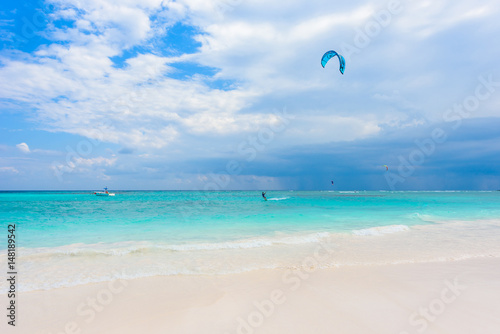 Kite surfing at paradise beach