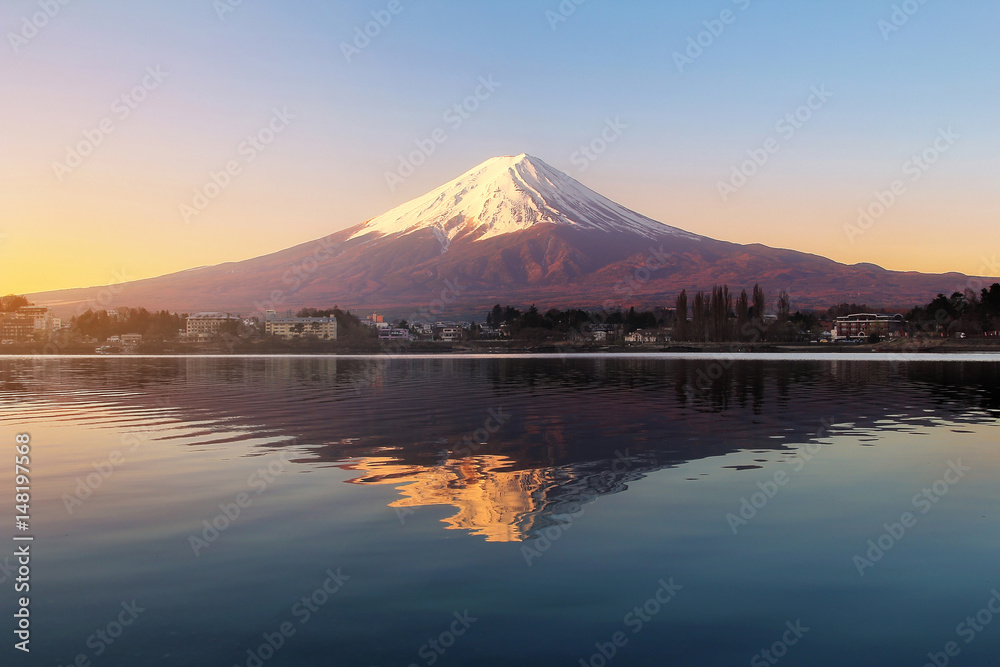 Beautiful scenery during sunrise at Mountain Fuji in kawaguchiko lake of Japan. This is a very popular for photographers and tourists. Travel and Attraction Concept