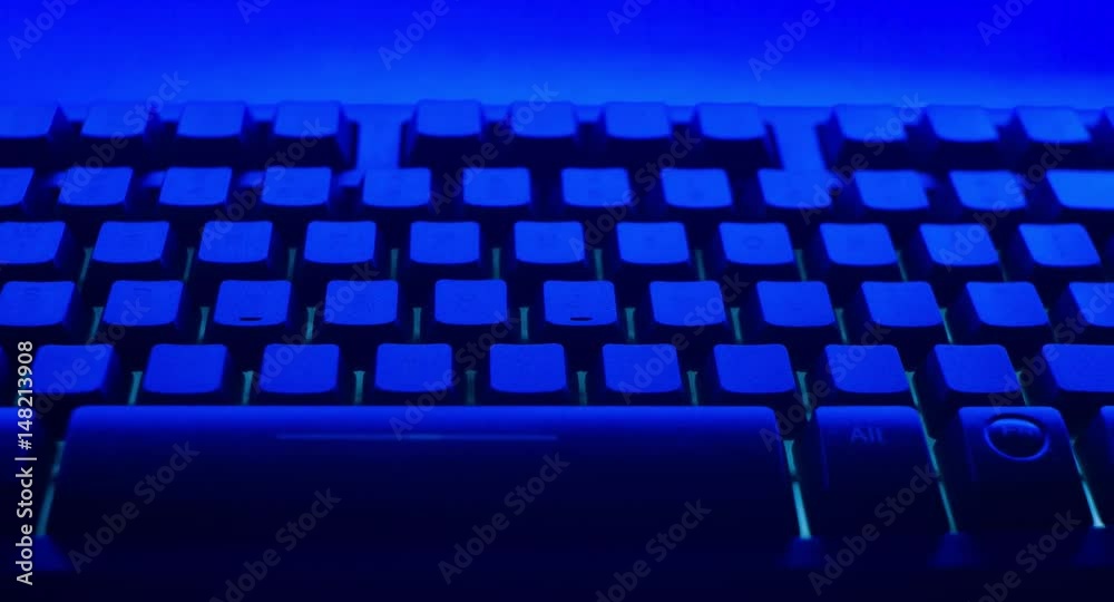Blue computer keyboard motion background Blue computer keyboard motion background
