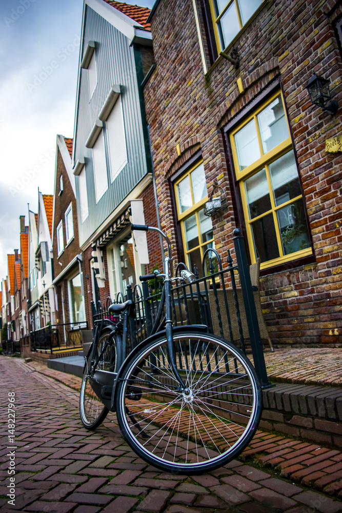 Bicycle next to house in the Netherlands