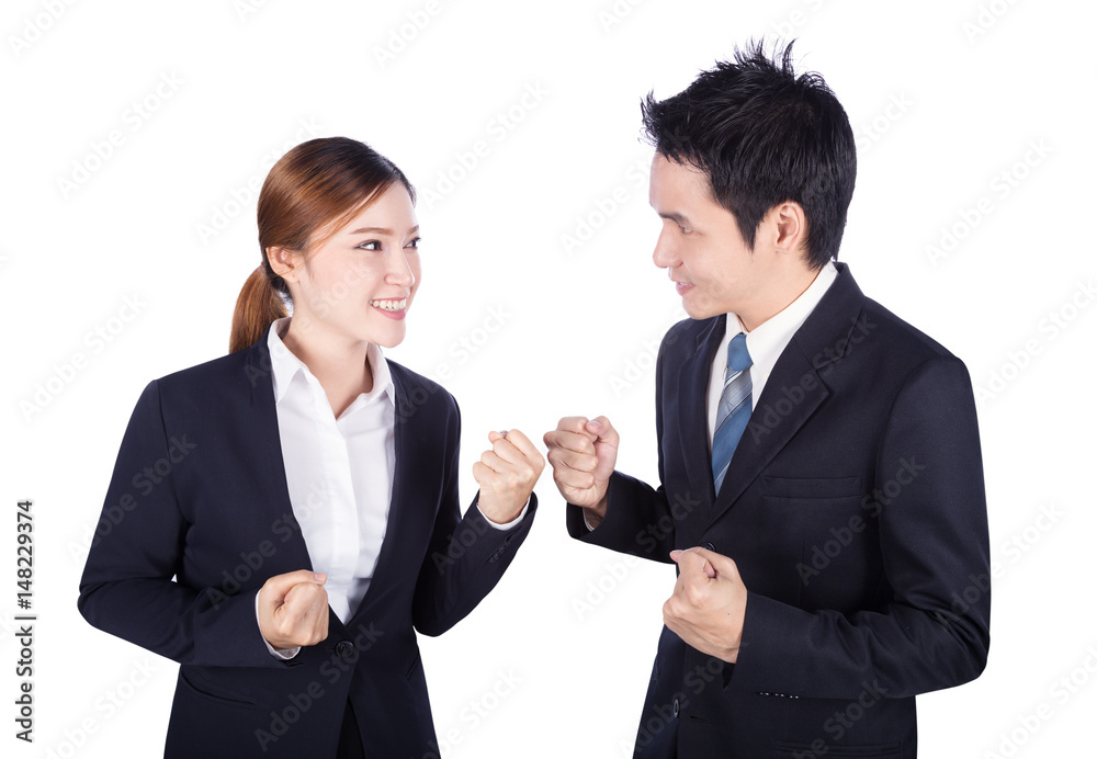 Successful business man and woman with arm raised isolated on white Successful business man and woman with arm raised isolated on white