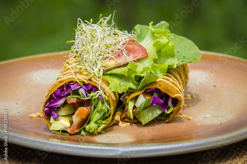 Vegan wraps with raw vegetables . Island Bali, Ubud, Indonesia