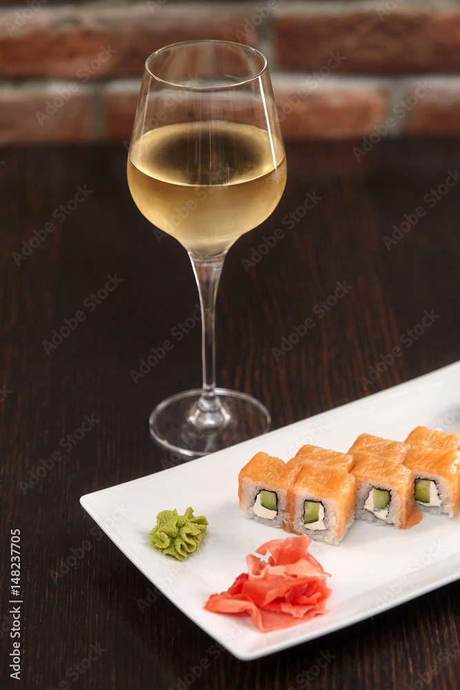 Philadelphia maki sushi rolls with salmon, cheese cream and cucumber