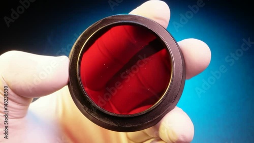 Close up of a classic camera lens filter 
