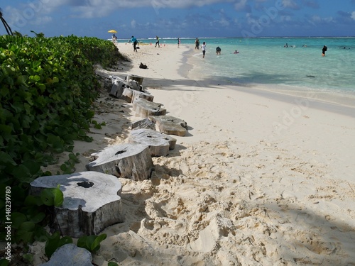 Soft  white sands of Managaha Island Tourists and locals continue to patronize Managaha Island for its soft  sandy beaches and crystal clear waters.