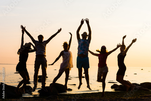 Happy friends having a party on a beach. Young, freedom, beach, summer, concept.