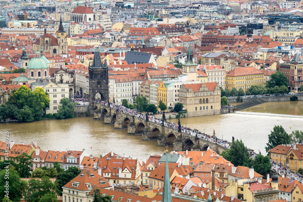 Many Tourists on the Charles Bridge in Prague