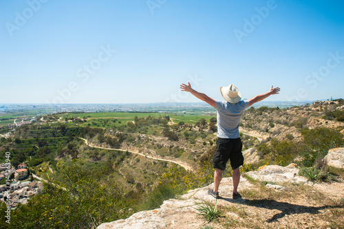 Man on the mountain. Concept of happiness, success, freedom