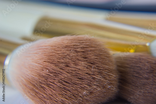 Close up of brushes, makeup applicators.