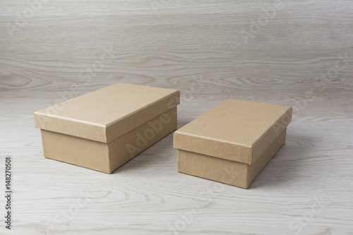 Two Paper box on white wooden background