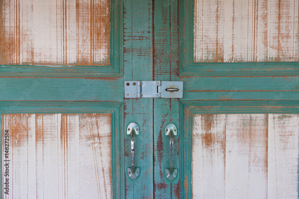Green asian ancient wooden slide door with handle and keylock. The ancient door for back to the past. Green asian ancient wooden slide door with handle and keylock. The ancient door for back to the past.