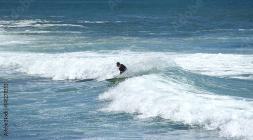 Surfer in a portuguese beach in Estoril, Portugal. April 2017