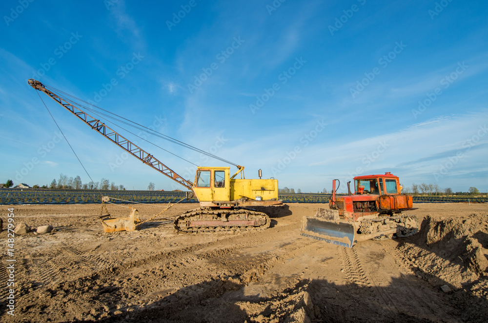 Tractor and excavator