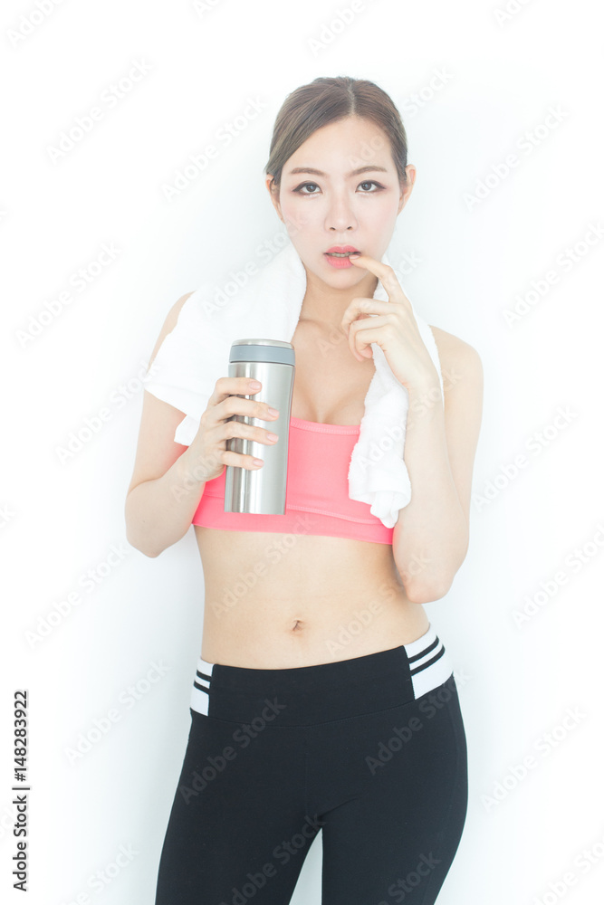 Korean woman holding water bottle for drink, woman fashion set sweet pink sexy girl, sport woman concept., isolated with white background. Korean woman holding water bottle for drink, woman fashion set sweet pink sexy girl, sport woman concept., isolated with white background.