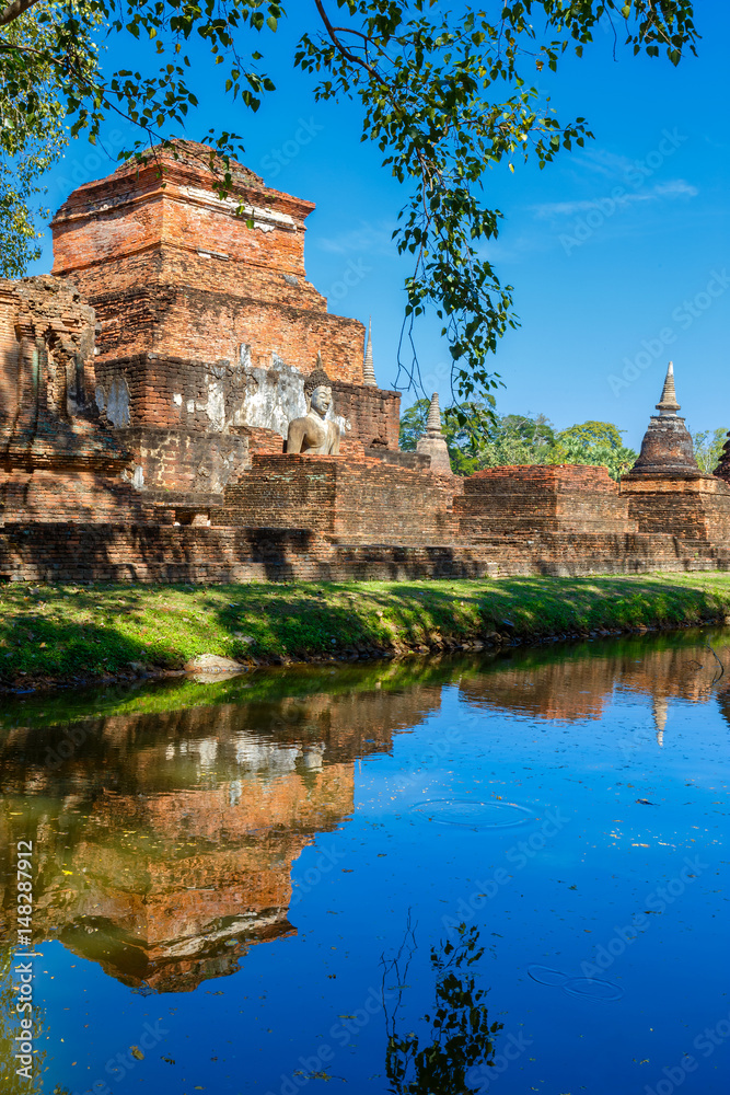 Wat Mahathat Temple in the precinct of Sukhothai Historical Park, a UNESCO World Heritage Site in Thailand Wat Mahathat Temple in the precinct of Sukhothai Historical Park, a UNESCO World Heritage Site in Thailand