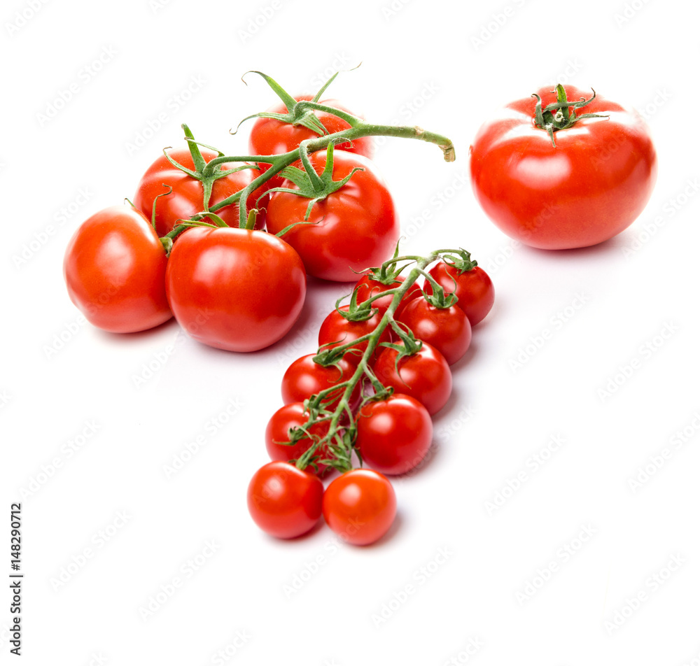 Composition of small cherry and large tomato. Isolated Composition of small cherry and large tomato. Isolated