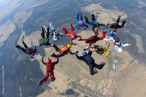 Skydivers in the sky