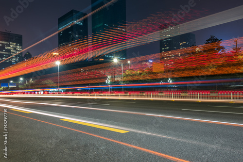 urban traffic with cityscape at night in city of China.