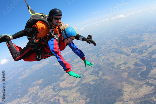 Skydiving tandem passenger in the sky