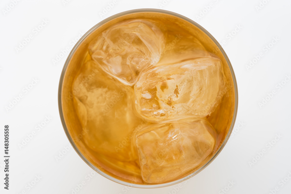 Glass of lemon ice tea isolated on white background. From top view Glass of lemon ice tea isolated on white background. From top view