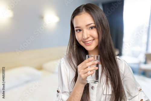 Beautiful girl with a cup