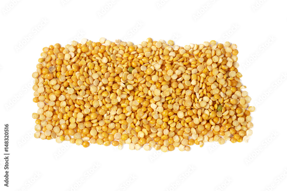 Dry yellow split peas isolated on white.