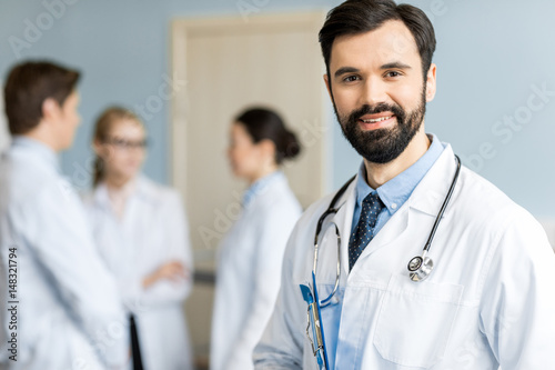 smiling doctor in clinic