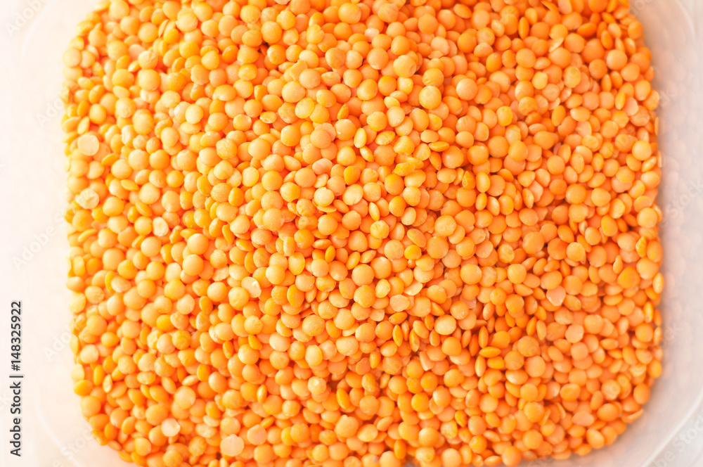 Lentils red color on wooden table Lentils red color on wooden table