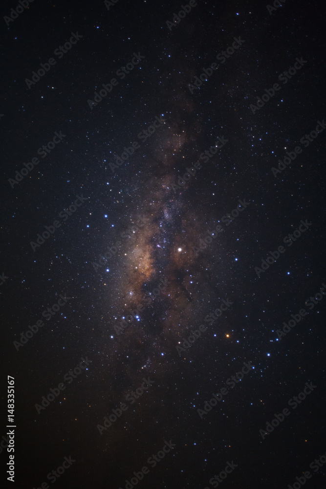 Naklejka premium Milky way galaxy with stars and space dust in the universe, Long exposure photograph, with grain.