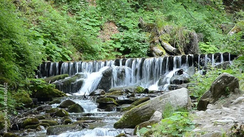 Video of a small waterfall in the mountains.