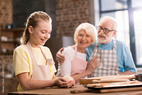 Family kneading dough