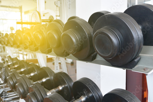 fitness dumbbells, weights equipment, selective focus, fitness club, black and white photography