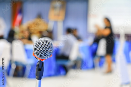 microphone wireless in a meeting room seminar conference background: Select focus with shallow depth of field.