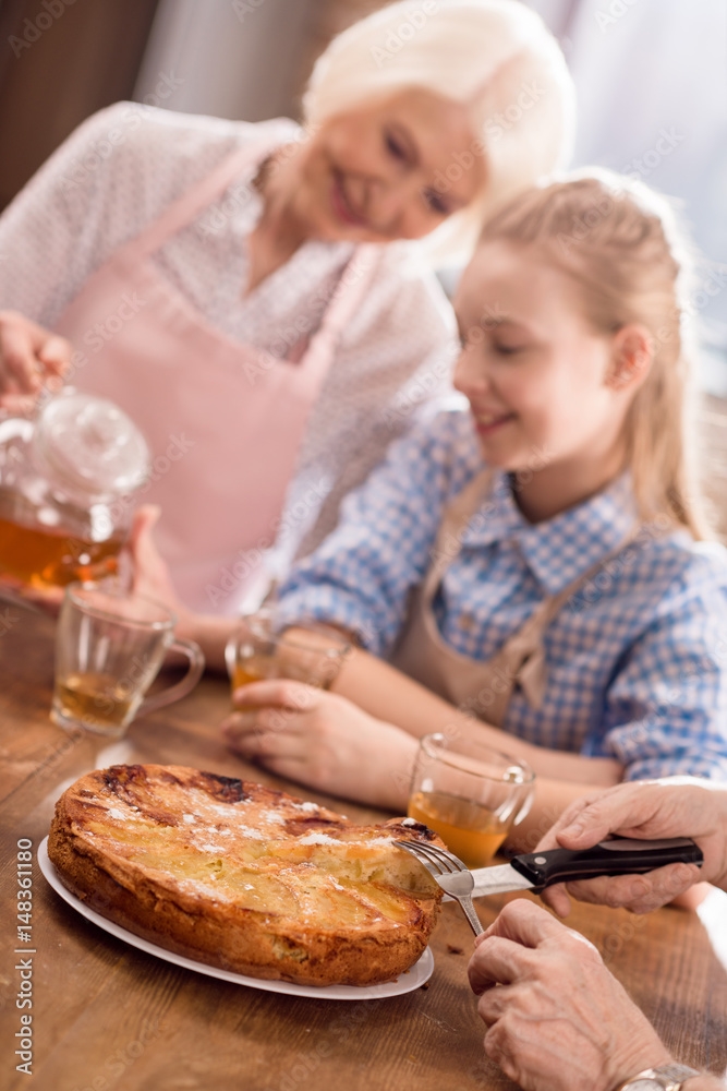 man cutting homemade pie man cutting homemade pie