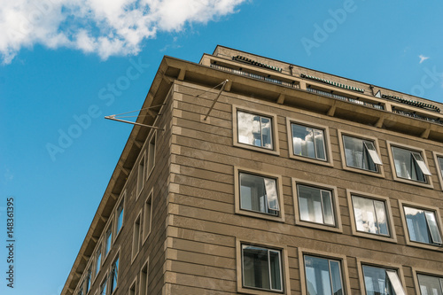 brown office building with big windows © Robert Herhold