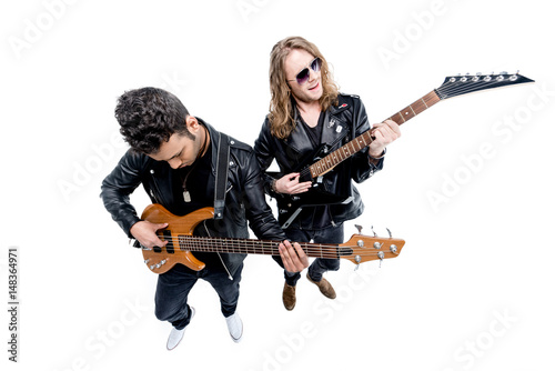 elevated view of musicians with electric guitars  isolated on white, hard rock music concept