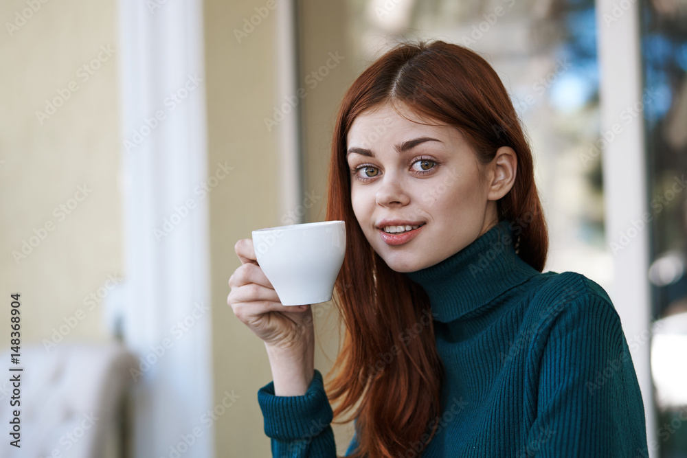woman with a mug in her hand, morning woman with a mug in her hand, morning
