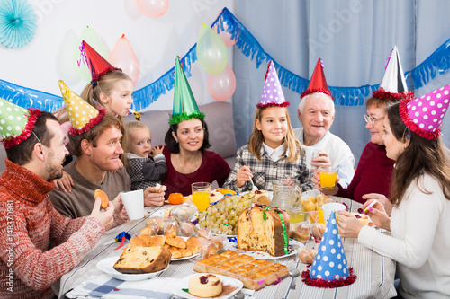 Glade family behaving jokingly during party