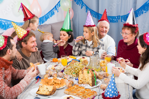Adults with children are happy to celebrate children’s birthday