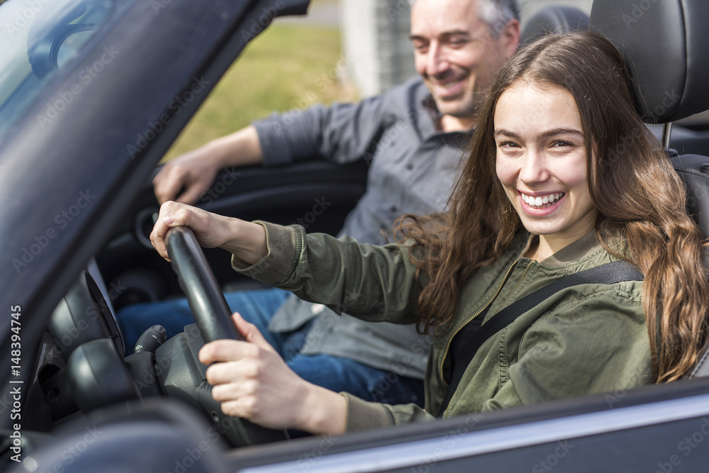 Teen learning to drive or taking driving test. Teen learning to drive or taking driving test.