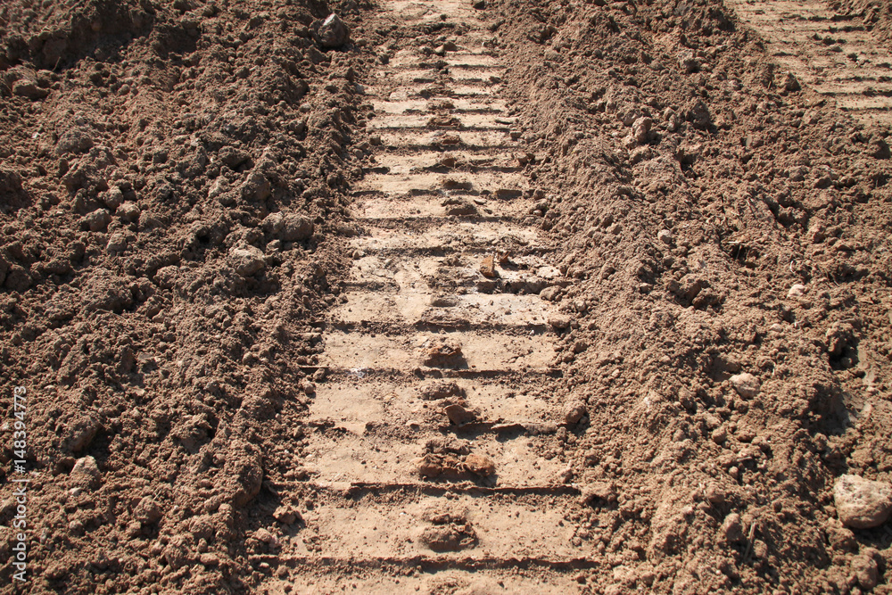 tractor track on sandy soil tractor track on sandy soil