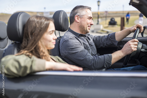 Father On Car Journey With Teenage daughter