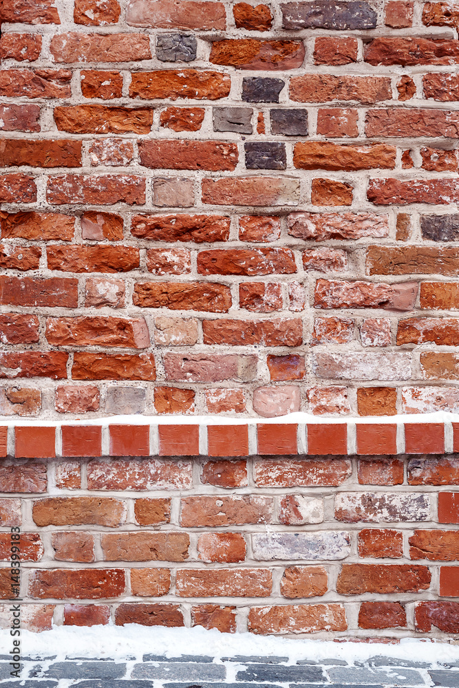 Fototapeta premium Brick wall and snow