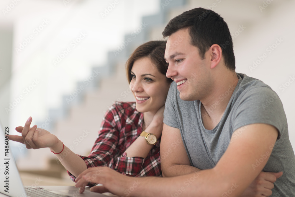 happy young couple buying online happy young couple buying online