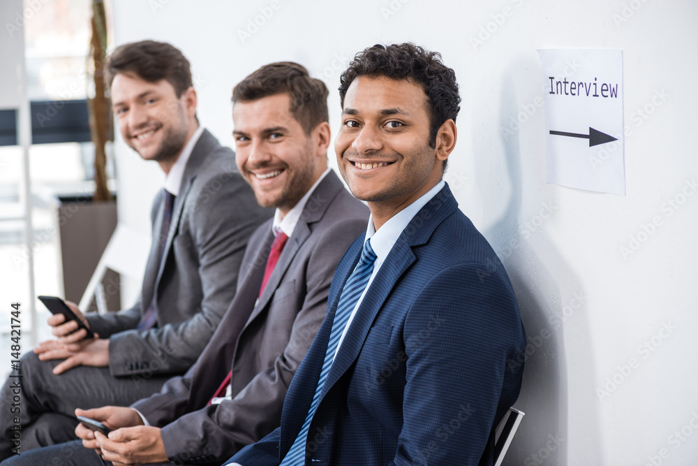 businessmen sitting in queue and waiting for interview in office, business concept businessmen sitting in queue and waiting for interview in office, business concept