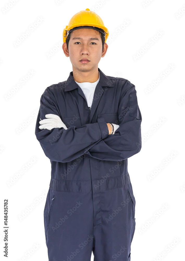 Young worker standing with arm crossed Young worker standing with arm crossed
